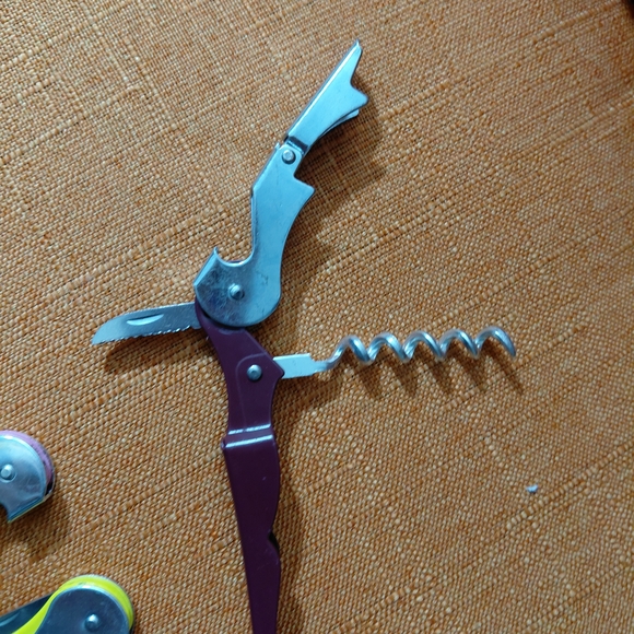 $25.00 for the set: Multicolor Corkscrew Bottle Opener Set. $10.00 each. - Picture 3 of 3